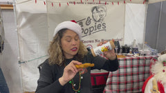 Customer trying Oma and Popie's Fry Sauce on chicken tender