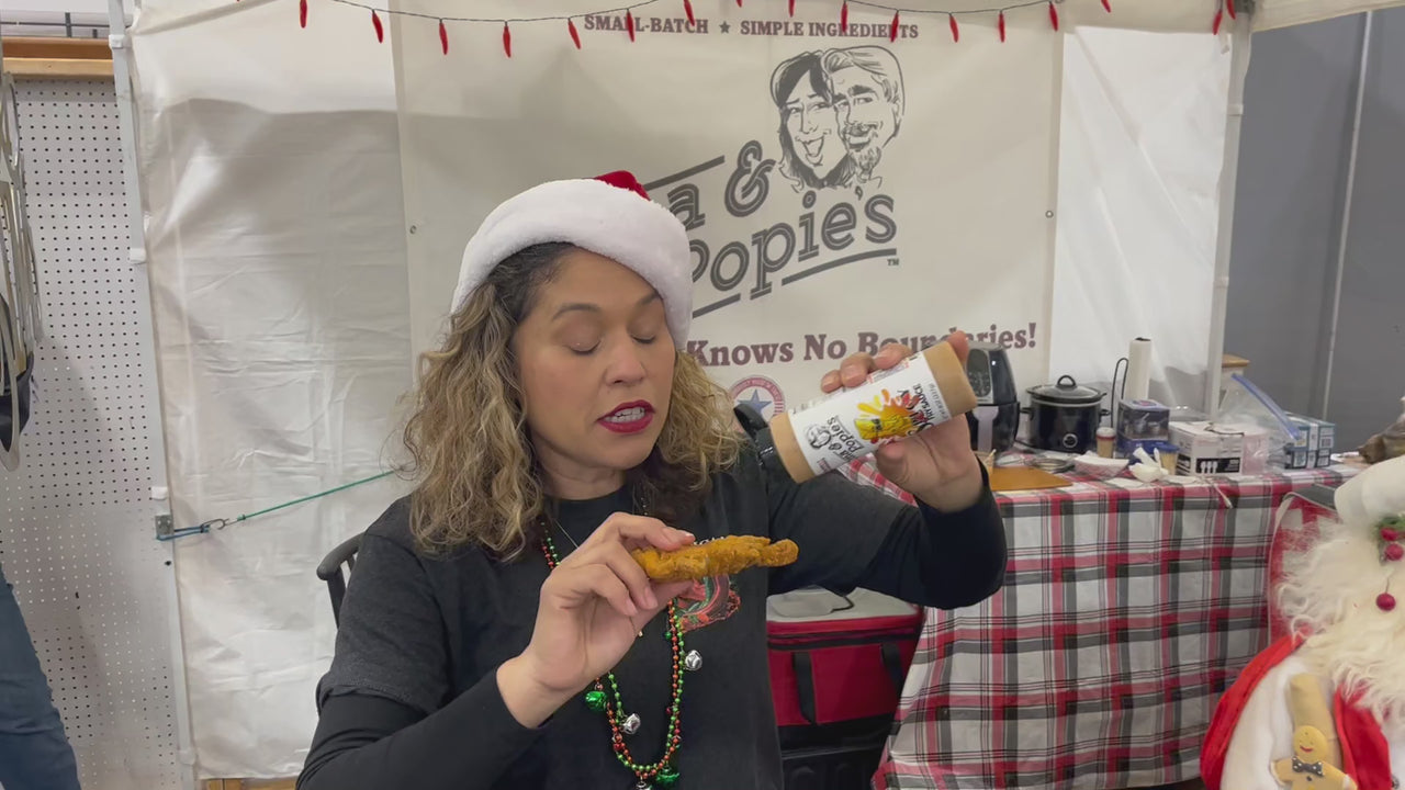 Customer trying Oma and Popie's Fry Sauce on chicken tender